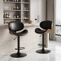 Ensemble de deux chaises de bar pivotantes réglables en hauteur, en similicuir noir et marron, bois et aluminium